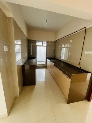 Kitchen in 2 BHK Apartment at Je and Vee Madhuban, Malad East – for Rent