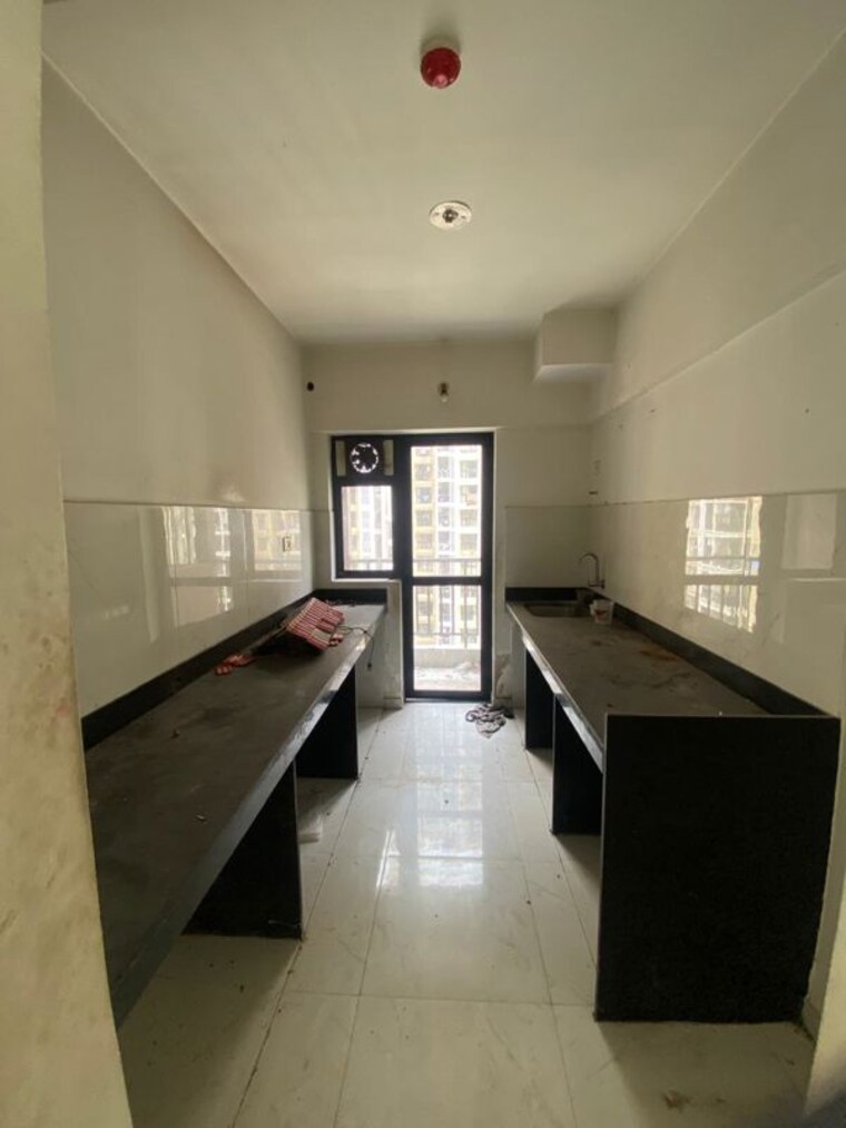 Kitchen, runwal-gardens-phase-i 2 Bedroom 606 Sq.Ft. Apartment In Dombivli East Thane 10622799