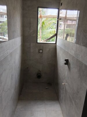 Bathroom in 1 BHK Apartment at Silver Om Yashodhan CHS, Naupada – for Sale