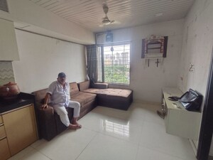 Living Room in 1 BHK Apartment at Lodha Crown Quality Homes, Majiwada – for Rent