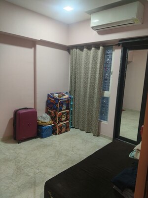 Living Room in 1 BHK Apartment at Lodha Quality Home Tower 5, Majiwada – for Rent