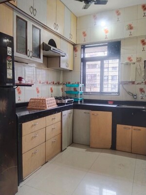 Kitchen in 2 BHK Apartment at Haware Splendor, Kharghar – for Rent