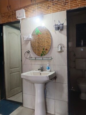 Bathroom in 2 BHK Apartment at Haware Splendor, Kharghar – for Rent