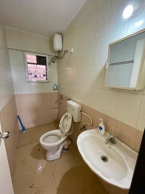 Bathroom in 2 BHK Apartment at Raichandani Megha Terrace CHS, Aundh – for Rent