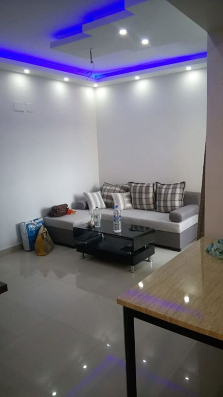Living Room, ambuja-neotia-bengal-ambuja-upohar 2 Bedroom 836 Sq.Ft. Apartment In Garia Kolkata 10099572