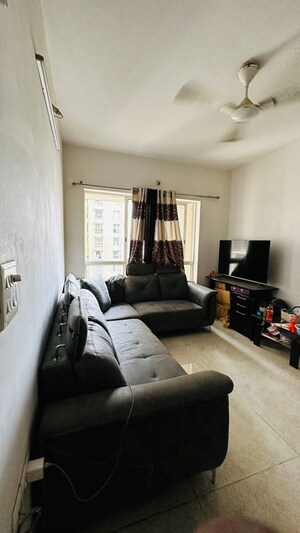 Living Room in 2 BHK Apartment at Lodha Amara, Kolshet Road – for Rent