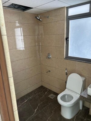 Bathroom in 3 BHK Apartment at Kalpataru Immensa, Kolshet Road – for Rent