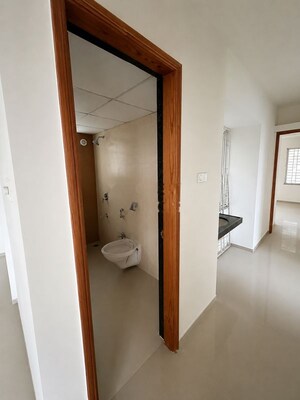 Room in 2 BHK Apartment at Kunal Iconia, Mamurdi – for Rent