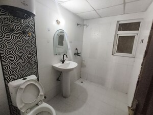 Bathroom in 2 BHK Apartment at Paramount Floraville, Sector 137 – for Rent