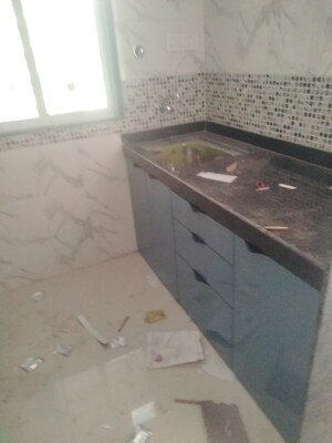 Kitchen in 1 BHK Apartment at DGS Sheetal Tapovan, Malad East – for Sale