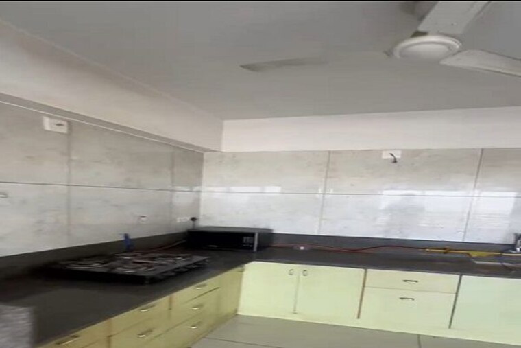 Kitchen, 42-parkview 3 Bedroom 2100 Sq.Ft. Apartment In Science City Ahmedabad 10623156