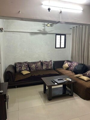 Living Room in 2 BHK Apartment at Ganadhish Empire CHSL, Pimple Saudagar – for Rent