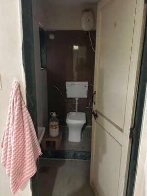 Bathroom in 2 BHK Apartment at Ganadhish Empire CHSL, Pimple Saudagar – for Rent