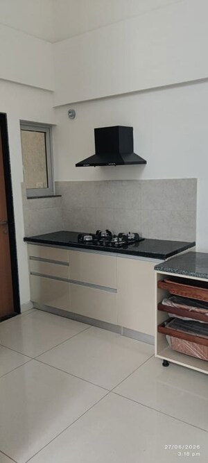 Kitchen in 2 BHK Apartment at Gera Planet Of Joy, Kharadi – for Rent