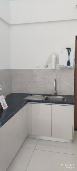 Kitchen in 2 BHK Apartment at Gera Planet Of Joy, Kharadi – for Rent
