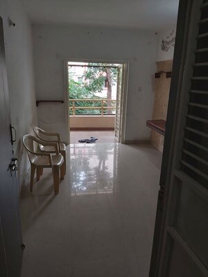Living Room in 1 BHK Apartment at Karan Green, Warje – for Rent