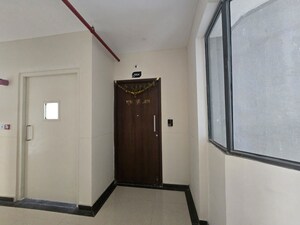 Building Lobby in 2 BHK Apartment at Shapoorji Pallonji Joyville Hinjewadi, Hinjewadi – for Rent