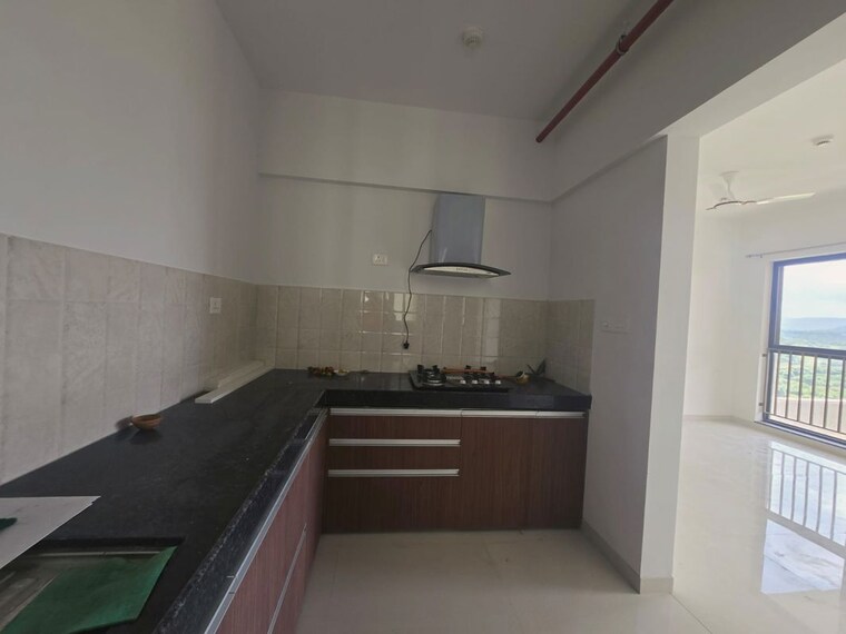 Kitchen, shapoorji-pallonji-joyville-hinjewadi 2 Bedroom 637 Sq.Ft. Apartment In Hinjewadi Pune 10623366