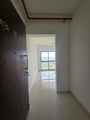 Building Lobby in 2 BHK Apartment at Shapoorji Pallonji Joyville Hinjewadi, Hinjewadi – for Rent