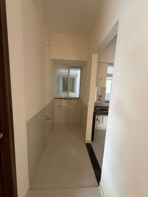 Building Lobby in 2 BHK Apartment at Godrej Green Vistas, Mahalunge – for Rent