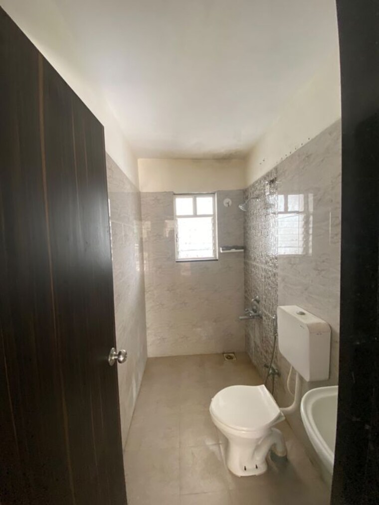 Bathroom, vedant-kingston-aura 2 Bedroom 1000 Sq.Ft. Apartment In Handewadi Pune 10623453