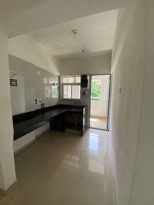 Kitchen in 2 BHK Apartment at Vedant Kingston Aura, Handewadi – for Rent