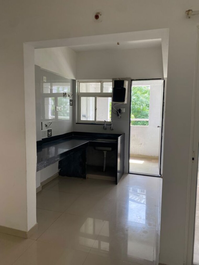 Kitchen, vedant-kingston-aura 2 Bedroom 1000 Sq.Ft. Apartment In Handewadi Pune 10623453