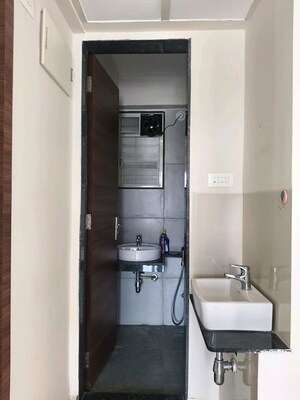 Bathroom in 2 BHK Apartment at Kuber Antonia, Wakad – for Sale