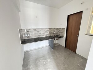 Kitchen in 2 BHK Apartment at Welworth Purnam, Hinjewadi – for Rent