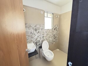 Bathroom in 2 BHK Apartment at Welworth Purnam, Hinjewadi – for Rent