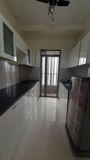 Kitchen in 2 BHK Apartment at Kalpataru Paramount, Kapur Bawdi – for Rent