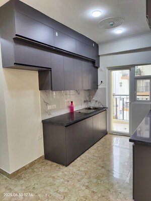 Kitchen in 3 BHK Apartment at Amrapali Terrace Homes, Tech Zone 4 Greater Noida – for Sale