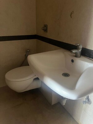 Bathroom in 3 BHK Apartment at Bhugaon – for Rent