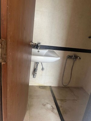 Bathroom in 3 BHK Apartment at Bhugaon – for Rent