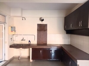Kitchen in 2.5 BHK Apartment at Mahagun My Woods, Sector 16c Greater Noida – for Rent