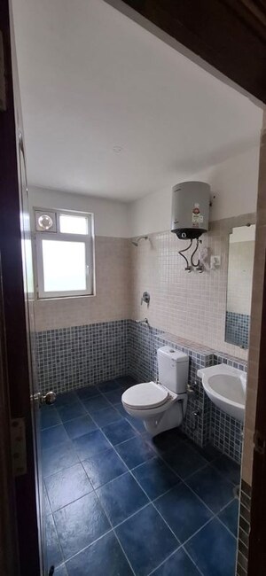 Bathroom in 3 BHK Apartment at ATS Golf Meadows, Central Derabassi – for Rent