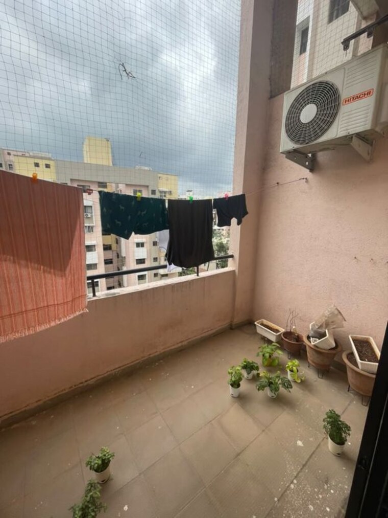 Balcony, magarpatta-city-cosmos 2 Bedroom 980 Sq.Ft. Apartment In Magarpatta Road Pune 10623813