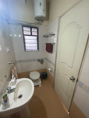 Bathroom in 2 BHK Apartment at Magarpatta City Cosmos, Magarpatta Road – for Rent