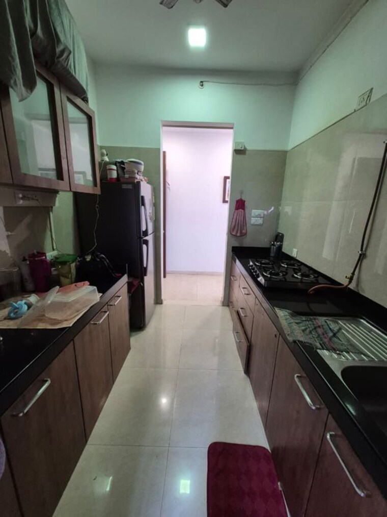 Kitchen, sapphire-chs-mira-road 3 Bedroom 1400 Sq.Ft. Apartment In Mira Road Thane 10624000