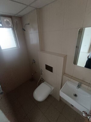 Bathroom in 1 BHK Apartment at Raunak Bliss, Ghodbunder Road – for Rent