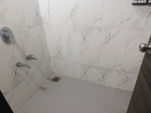Bathroom in 1 BHK Apartment at Dosti Desire Joy, Brahmand – for Rent