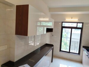 Kitchen in 2 BHK Apartment at Jiten Apartment, Andheri West – for Sale