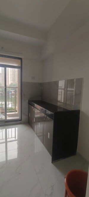 Kitchen in 1 BHK Apartment at Anant Metropolis Insignia Towers, Kasarvadavali – for Rent