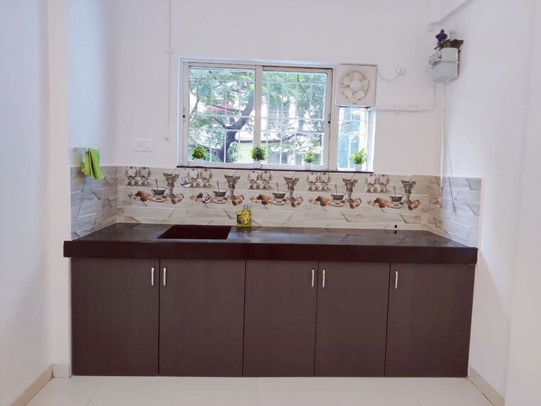 Kitchen, magarpatta-grevillea 3 Bedroom 1200 Sq.Ft. Apartment In Hadapsar Pune 10624098