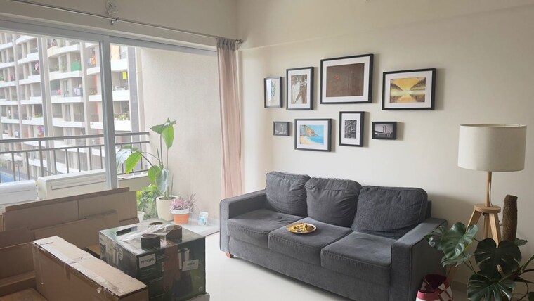 Living Room, mantra-montana-phase-1 2 Bedroom 742 Sq.Ft. Apartment In Dhanori Pune 10624142
