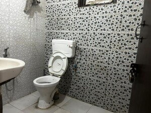 Bathroom in 1 RK Apartment at Sainik Farm – for Rent