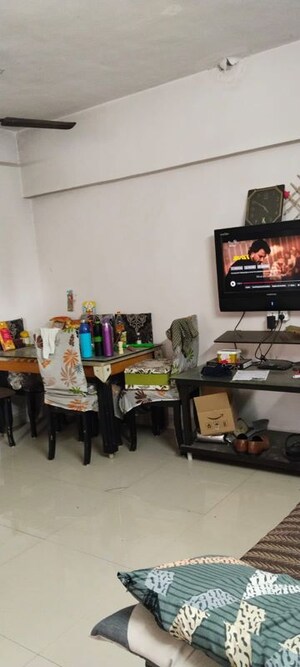 Living Room in 1 BHK Apartment at Gods Heaven CHS, Powai – for Sale