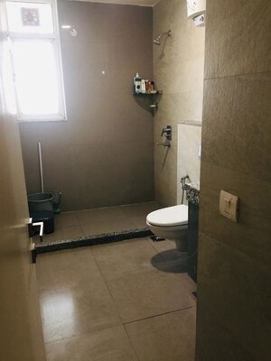Bathroom in 3.5 BHK Apartment at Orchid Petals, Sector 49 – for Sale