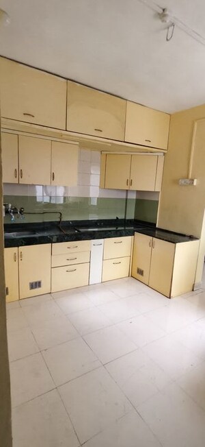 Kitchen in 1 BHK Apartment at Karan Ceto, Wadgaon Sheri – for Rent