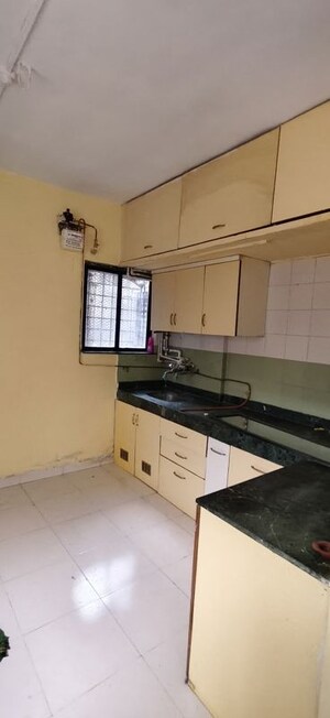 Kitchen in 1 BHK Apartment at Karan Ceto, Wadgaon Sheri – for Rent